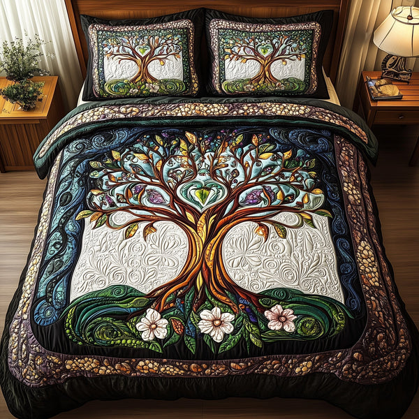 Ancient Tree Of Life quilted 3-piece bedding set on a made bed with two matching pillow shams