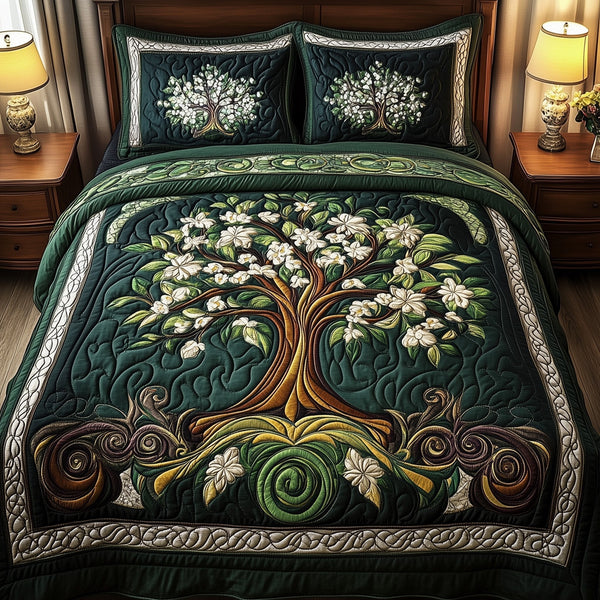 Ancient Tree Of Life quilted 3-piece bedding set on a made bed with two matching pillow shams