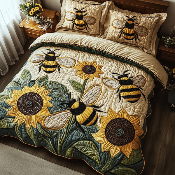 Buzzing Blossoms quilted 3-piece bedding set on a made bed with two matching pillow shams