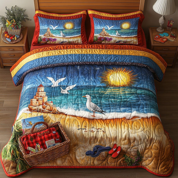 A Day At The Beach quilted 3-piece bedding set on a made bed in a light coastal bedroom