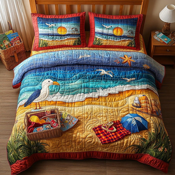 A Day At The Beach quilted 3-piece bedding set on a made bed in a light coastal bedroom