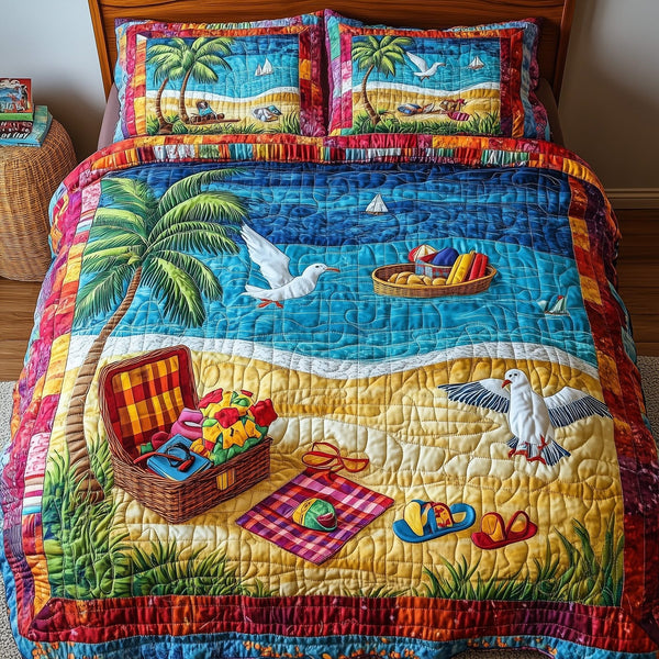 A Day At The Beach quilted 3-piece bedding set on a made bed in a light coastal bedroom