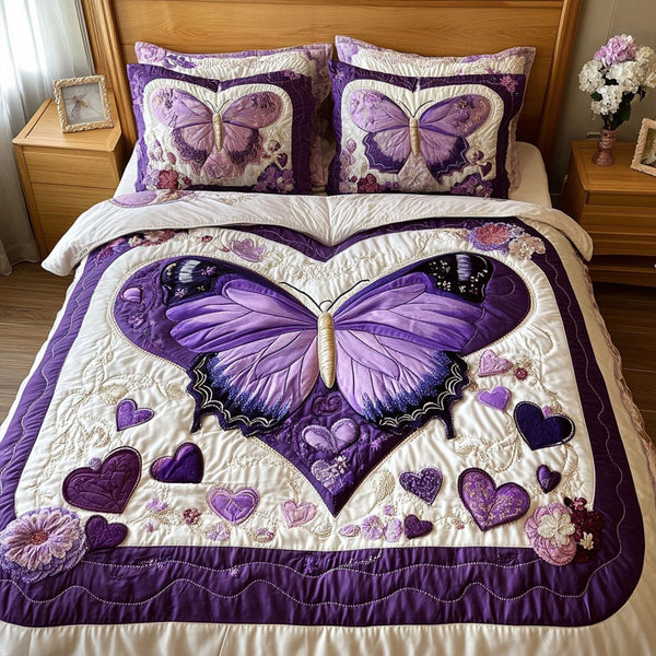 A Love That Takes Flight quilted 3-piece bedding set on a made bed with two matching pillow shams