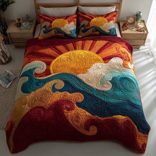 Abstract Sun Waves quilted 3-piece bedding set on a made bed in a light coastal bedroom