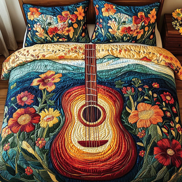 Acoustic Bloom quilted 3-piece bedding set on a made bed with two matching pillow shams