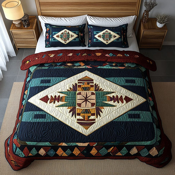 Adobe Dream quilted 3-piece bedding set on a made bed with two matching pillow shams