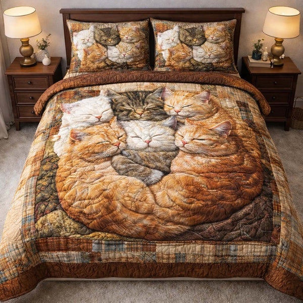 Adorable Cats quilted 3-piece bedding set on a made bed with two matching pillow shams