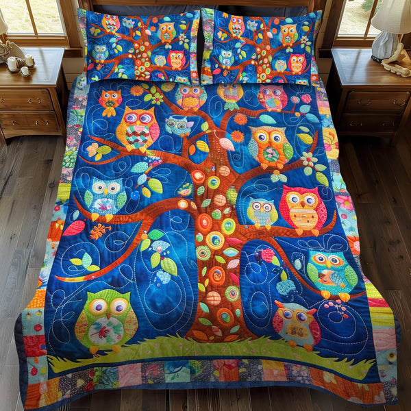 Adorable Owls quilted 3-piece bedding set on a made bed with two matching pillow shams