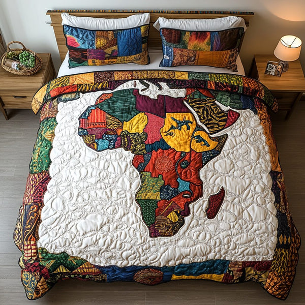 Africa Bound quilted 3-piece bedding set on a made bed with two matching pillow shams