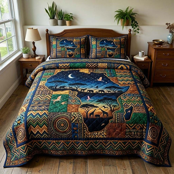 Africa Legacy quilted 3-piece bedding set on a made bed with two matching pillow shams