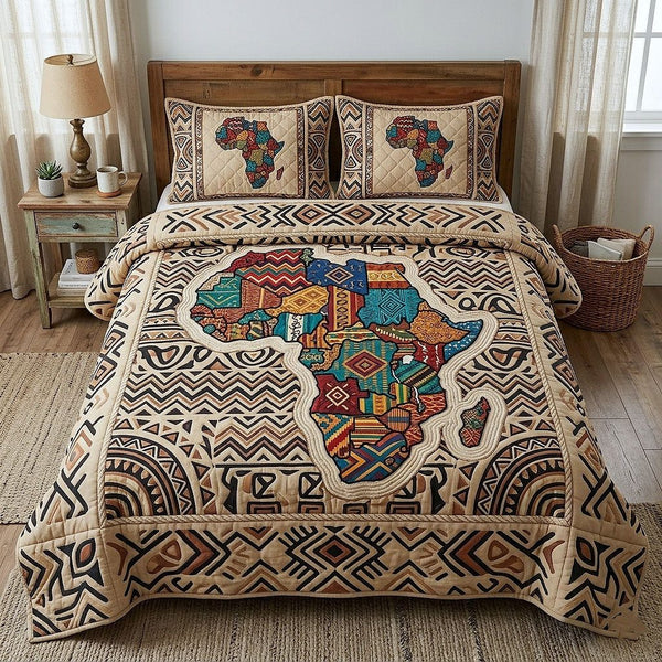 Africa Legacy quilted 3-piece bedding set on a made bed with two matching pillow shams
