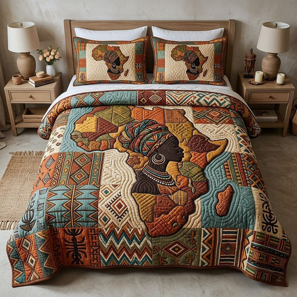 Africa Legacy quilted 3-piece bedding set on a made bed with two matching pillow shams