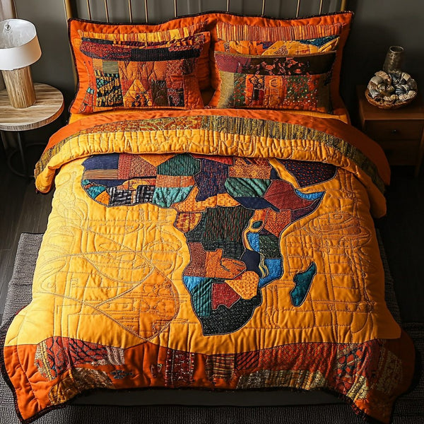 Africa Map quilted 3-piece bedding set on a made bed with two matching pillow shams