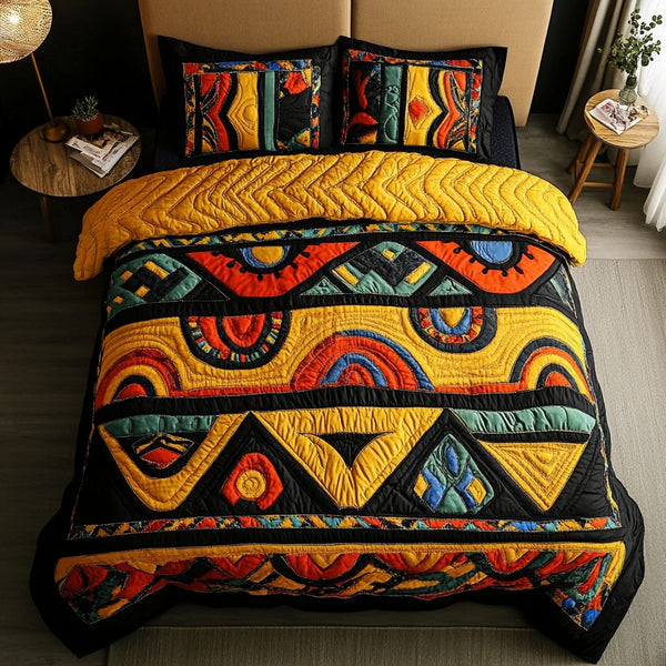 Africa Spirit quilted 3-piece bedding set on a made bed with two matching pillow shams
