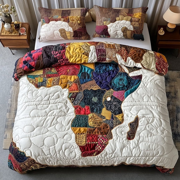 Africa Spirit quilted 3-piece bedding set on a made bed with two matching pillow shams