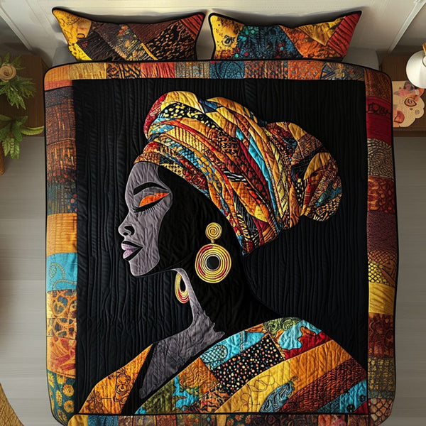 African Elegance quilted 3-piece bedding set on a made bed with two matching pillow shams