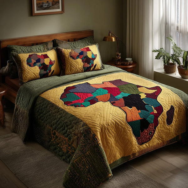 African Heritage quilted 3-piece bedding set on a made bed in a farmhouse bedroom