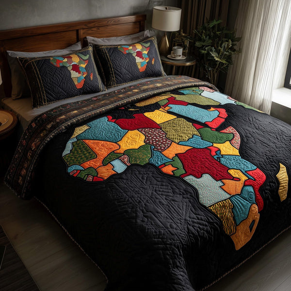 African Heritage quilted 3-piece bedding set on a made bed in a farmhouse bedroom