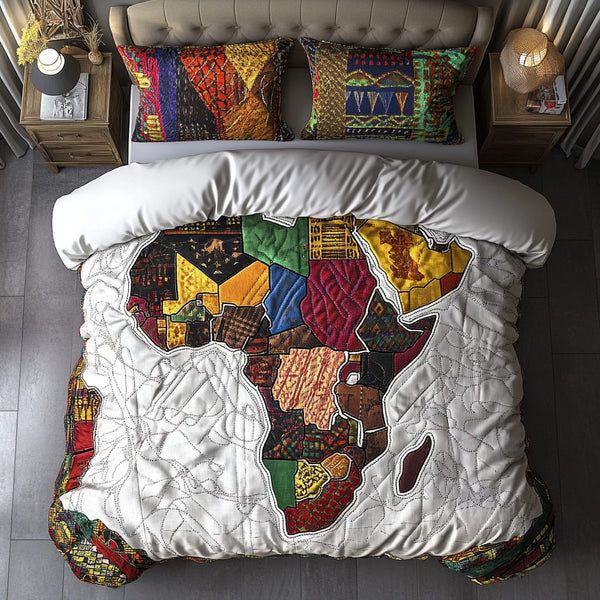 African Horizons quilted 3-piece bedding set on a made bed with two matching pillow shams