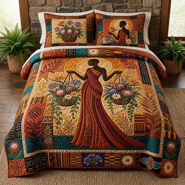 African Queen quilted 3-piece bedding set on a made bed with two matching pillow shams