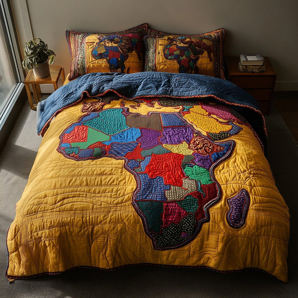 African Roots quilted 3-piece bedding set on a made bed with two matching pillow shams