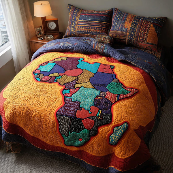 African Roots quilted 3-piece bedding set on a made bed with two matching pillow shams