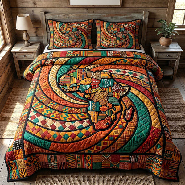 African Roots quilted 3-piece bedding set on a made bed with two matching pillow shams