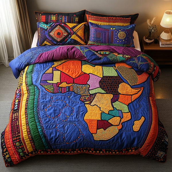 African Roots quilted 3-piece bedding set on a made bed with two matching pillow shams