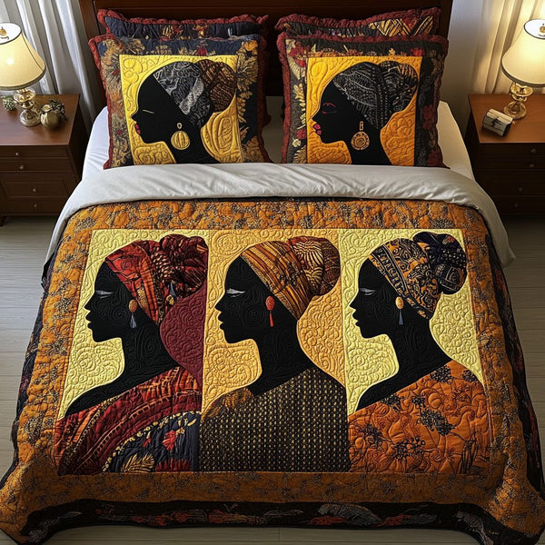 Afro Chic quilted 3-piece bedding set on a made bed with two matching pillow shams