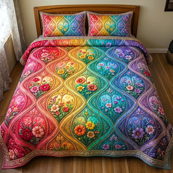 All Love Belongs quilted 3-piece bedding set on a made bed with two matching pillow shams