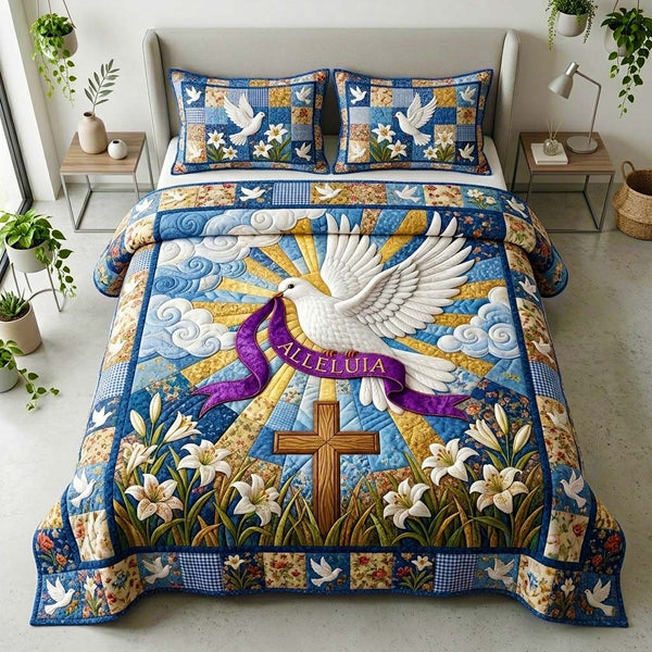 Alleluia Dove quilted 3-piece bedding set on a made bed with two matching pillow shams