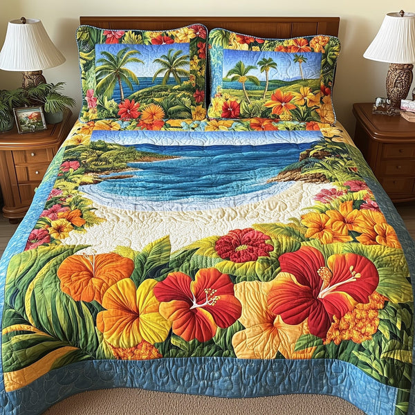 Aloha Beach quilted 3-piece bedding set on a made bed in a light coastal bedroom