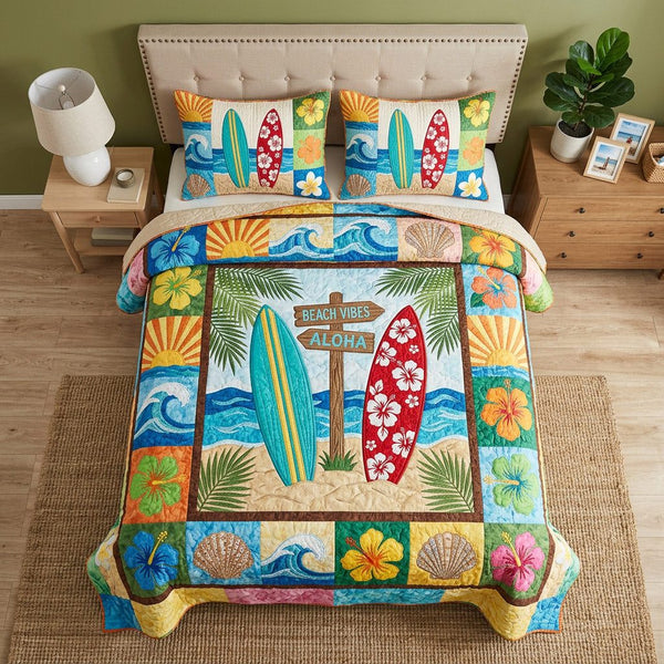Aloha Beach Vibes quilted 3-piece bedding set on a made bed in a light coastal bedroom