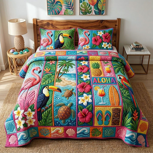 Aloha Breeze quilted 3-piece bedding set on a made bed with two matching pillow shams