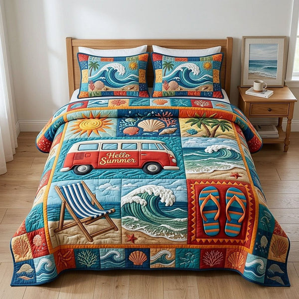 Aloha Breeze quilted 3-piece bedding set on a made bed with two matching pillow shams