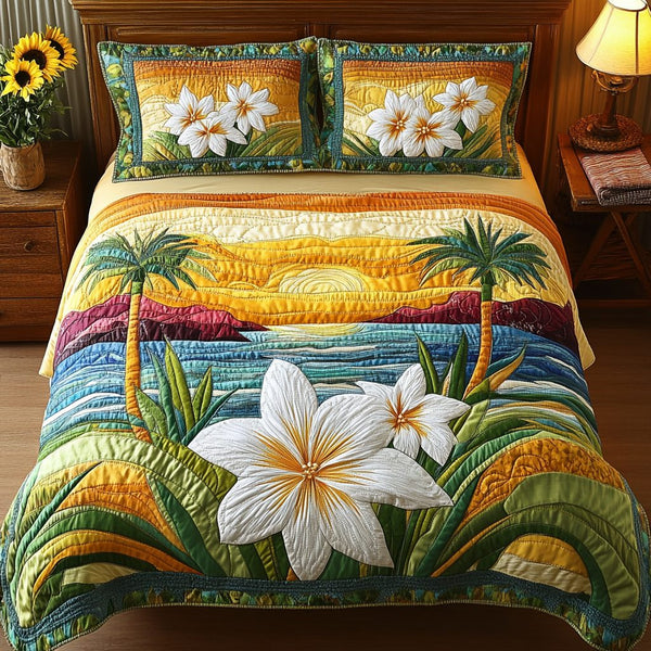 Aloha Comfort quilted 3-piece bedding set on a made bed with two matching pillow shams