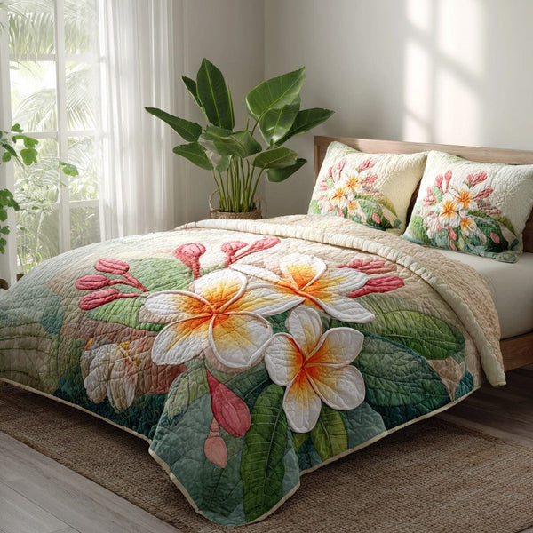 Aloha Dreams quilted 3-piece bedding set on a made bed with two matching pillow shams