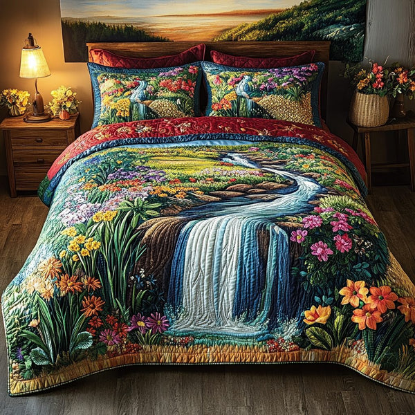 Aloha Waters quilted 3-piece bedding set on a made bed with two matching pillow shams