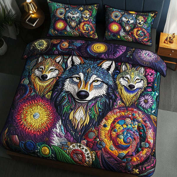 Alpha Trails quilted 3-piece bedding set on a made bed with two matching pillow shams