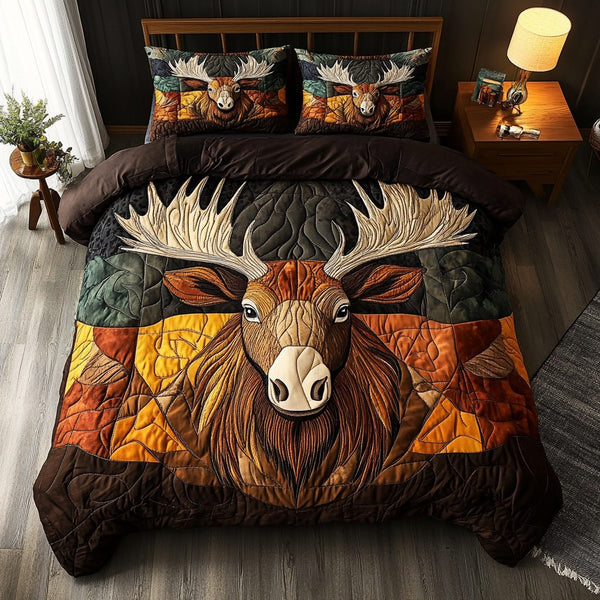 Alpine Antler Art quilted 3-piece bedding set on a made bed with two matching pillow shams
