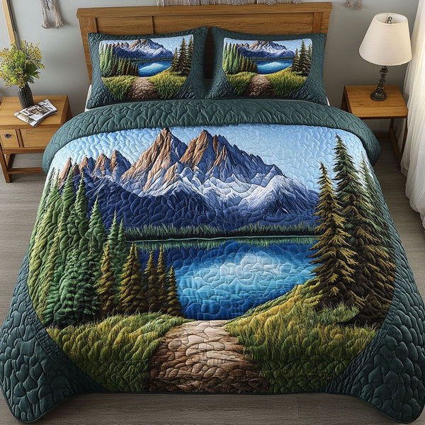 Alpine Reflection quilted 3-piece bedding set on a made bed with two matching pillow shams