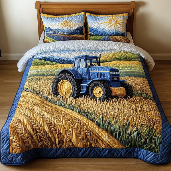 Amber Fields Tractor quilted 3-piece bedding set on a made bed with two matching pillow shams
