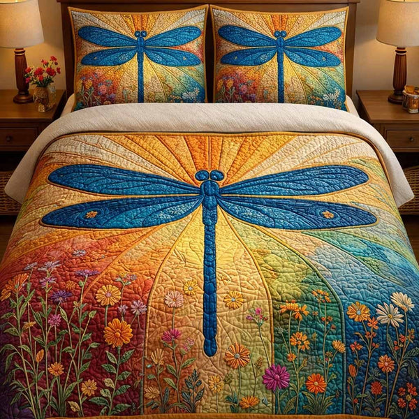 Amber Glow quilted 3-piece bedding set on a made bed with two matching pillow shams