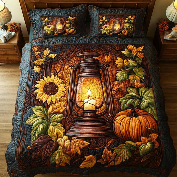 Amber Harvest Dreams quilted 3-piece bedding set on a made bed with two matching pillow shams