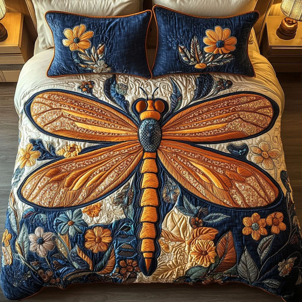 Amber Radiance quilted 3-piece bedding set on a made bed with two matching pillow shams