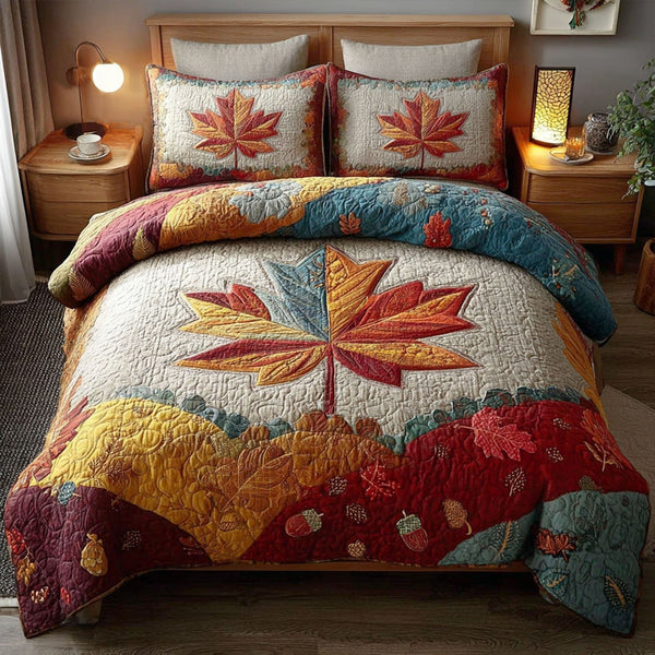 Amber Trail quilted 3-piece bedding set on a made bed with two matching pillow shams