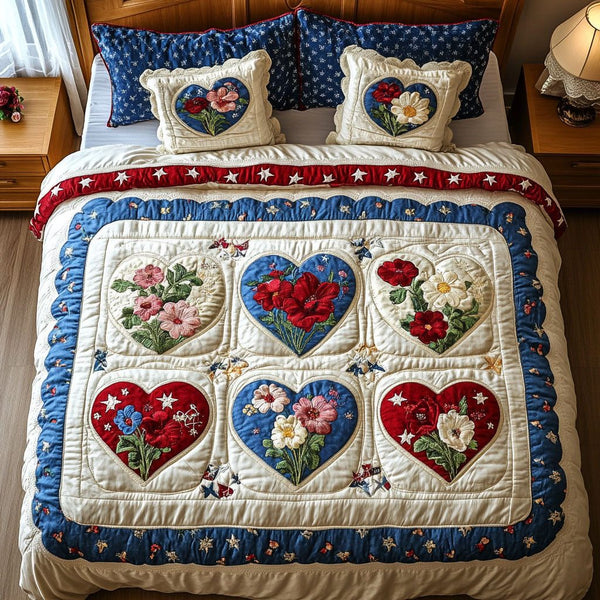America in Bloom quilted 3-piece bedding set on a made bed in a warmly lit bedroom