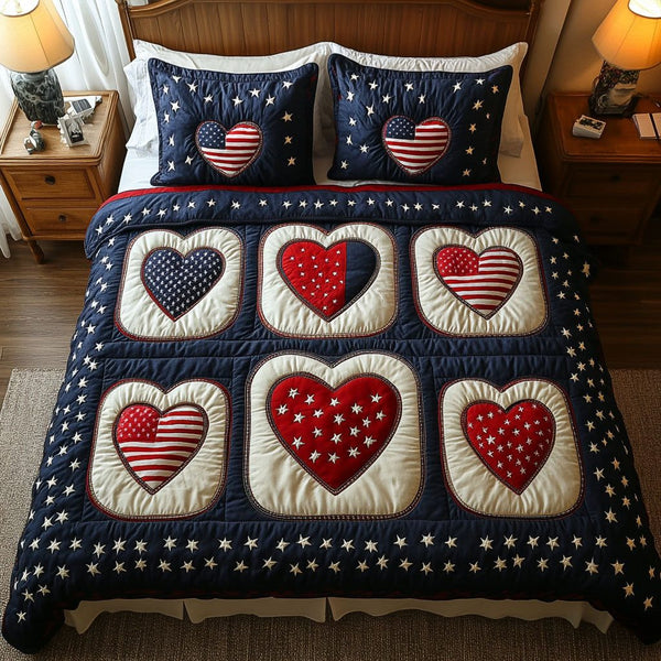 American Heartbeat quilted 3-piece bedding set on a made bed in a warmly lit bedroom