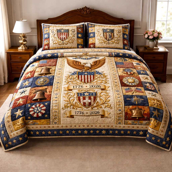 American Pride quilted 3-piece bedding set on a made bed in a warmly lit bedroom