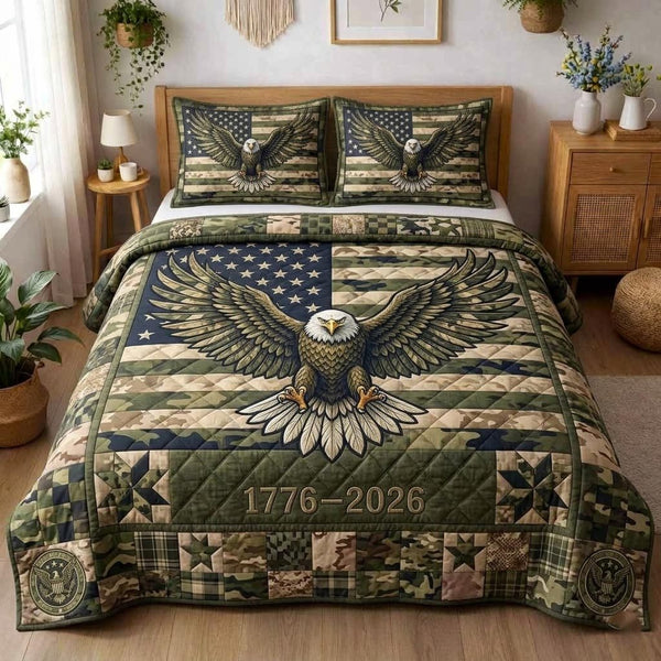 American Pride quilted 3-piece bedding set on a made bed in a warmly lit bedroom